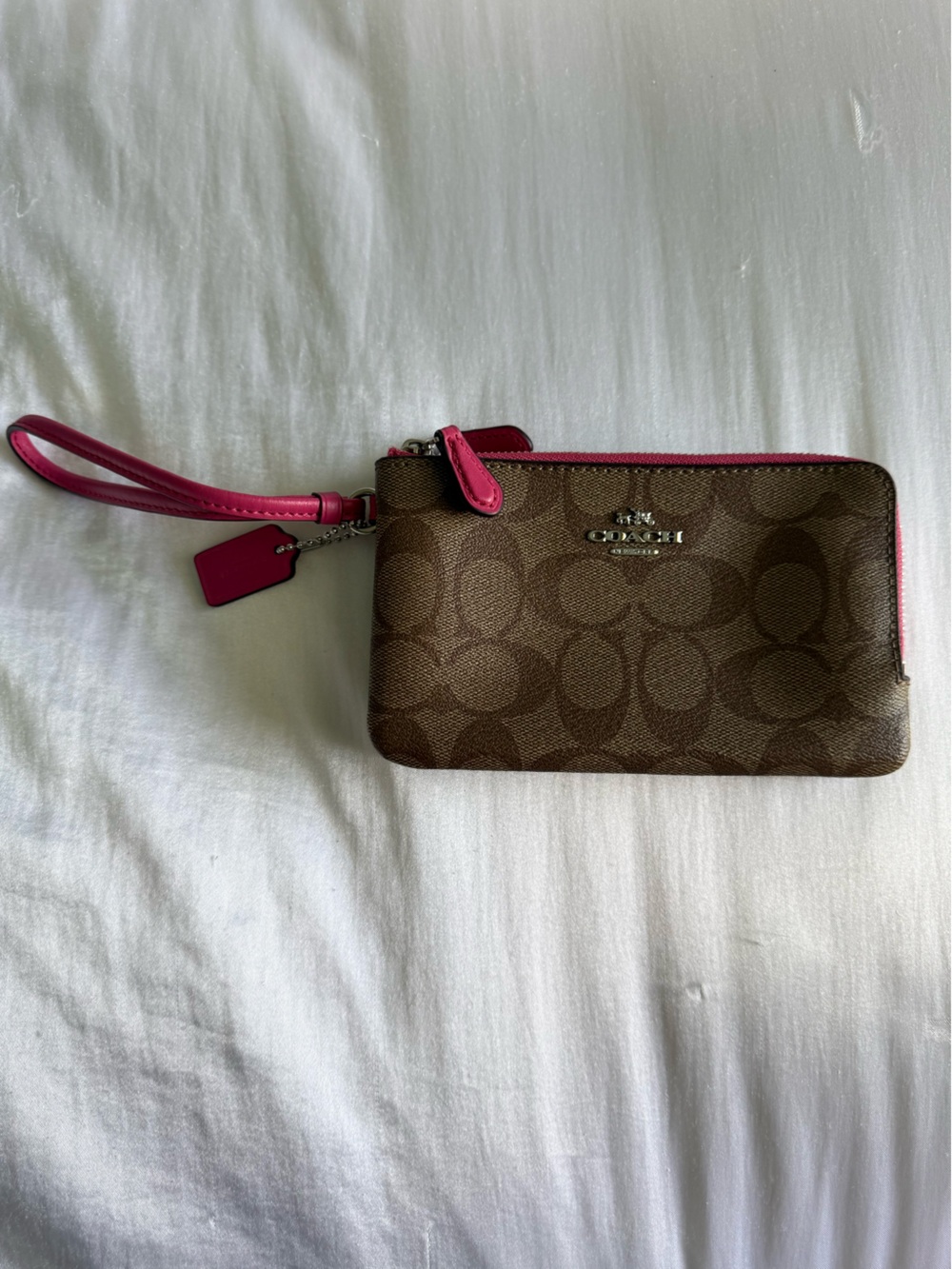 NEVER BEEN USED Coach Brown Signature Wristlet with Pink Trim